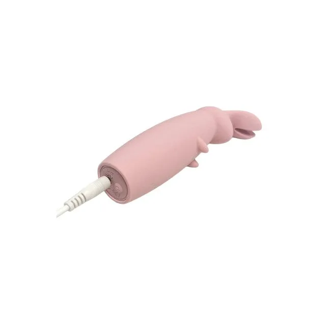 Aparat de masaj DREAMTOYS Nude Hazel Rabbit Massager. în formă de iepuraș. 10 funcții de vibrație. roz