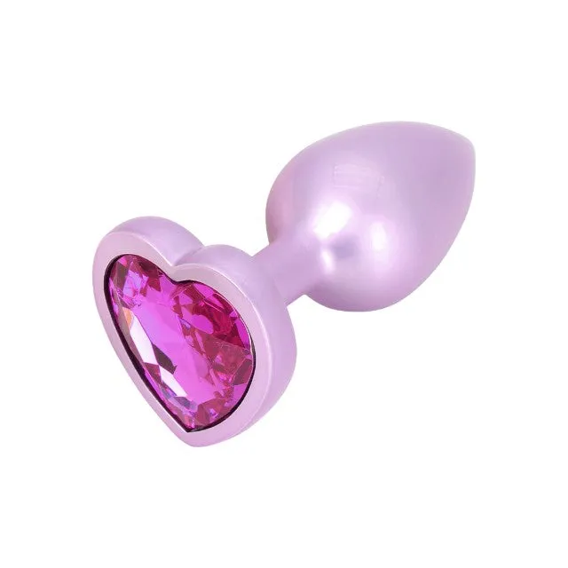 Plug anal TOYJOY Time to Shine. din aluminiu. cu bază în formă de inimă. lungime 7 cm. diametru 2.6 cm. culoare roz (10673P)